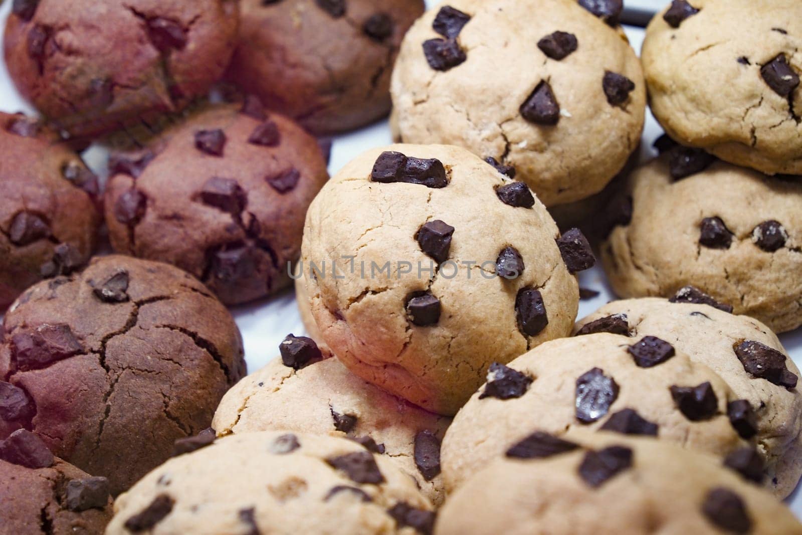 a pile of white chocolate chip close up .