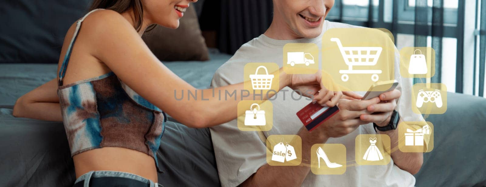 Elegant female and male customer with credit card control mobile phone choosing online platform. Smart consumers opening e-commerce application using cashless technology shopping inventory. Cybercash.