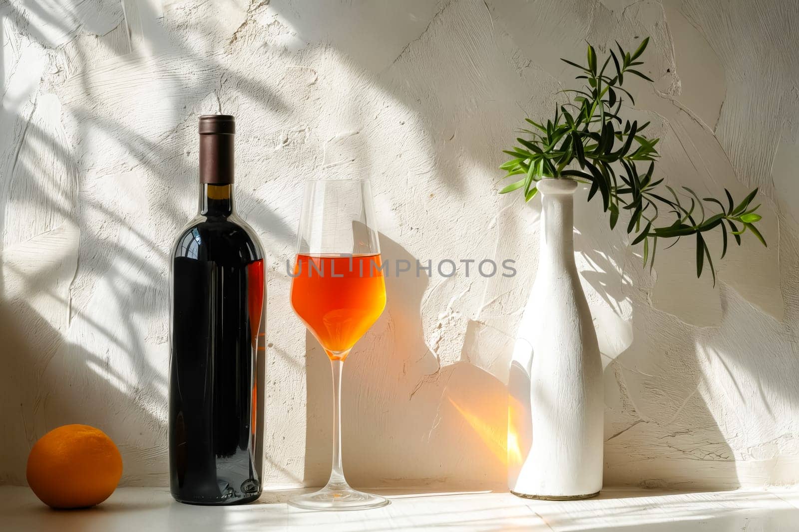 A bottle of wine and a wine glass are on a table next to a vase with a plant in it. The scene is set in a sunny room, with the sunlight shining on the table and the vase. Generative AI