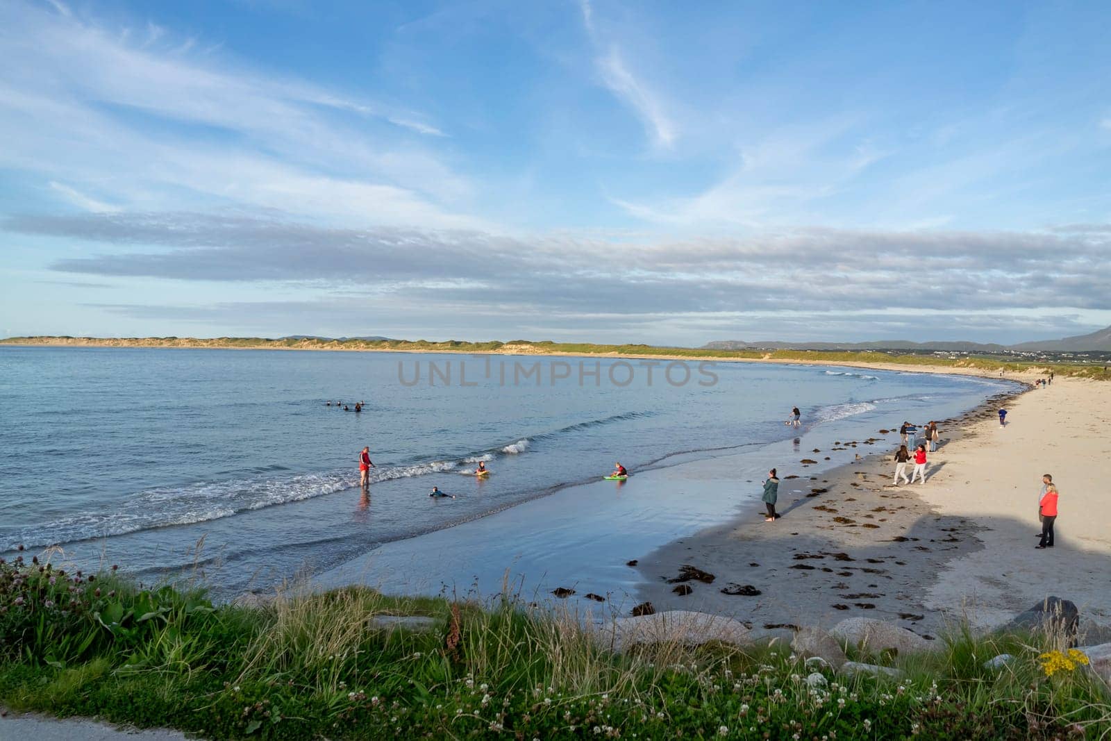 Magheraroarty, Ireland - July 31 2022: Holiday makers enjoying the are by TLC_Automation