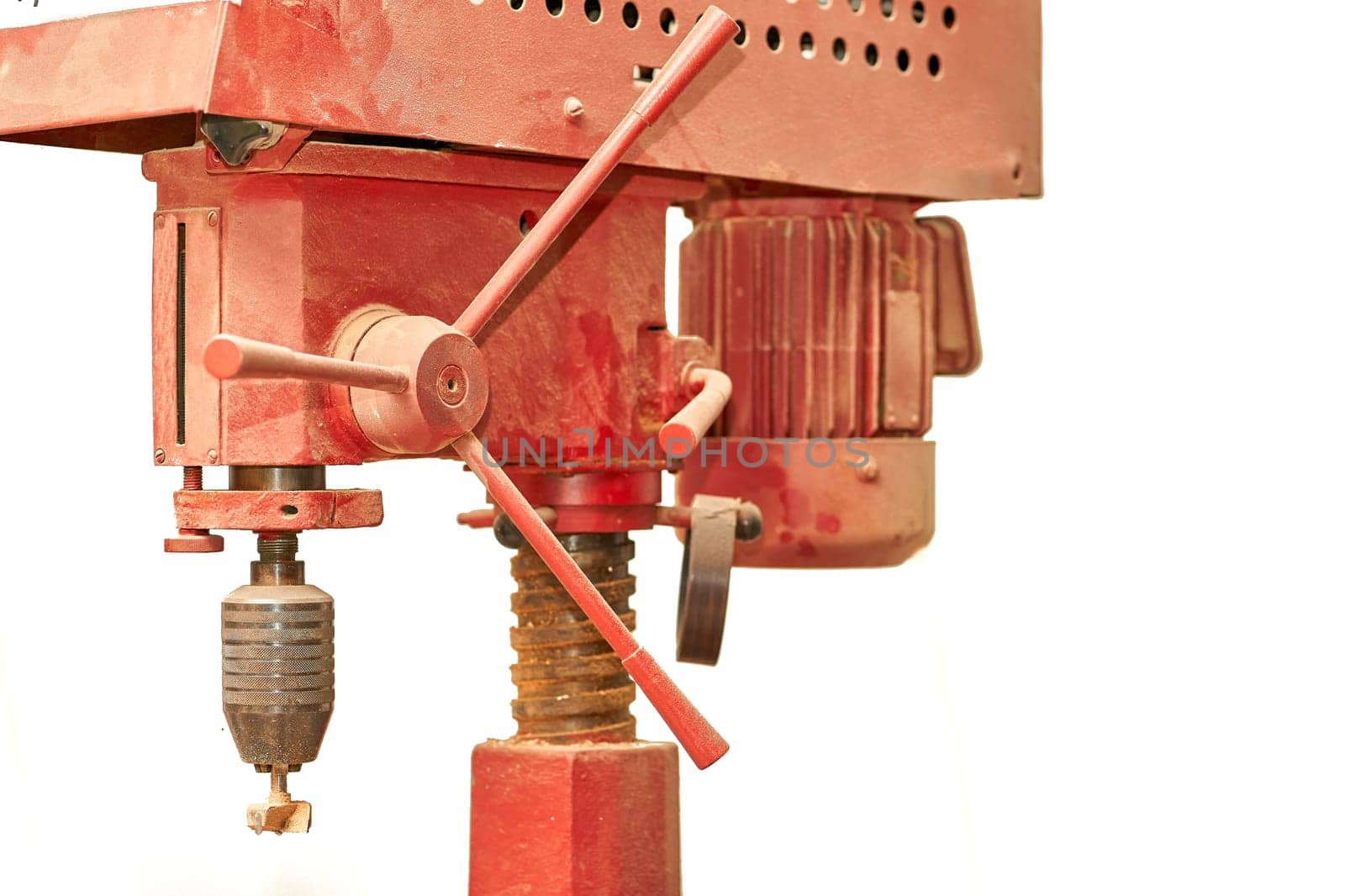 Red ginger professional drilling machine isolated on white background. by jovani68