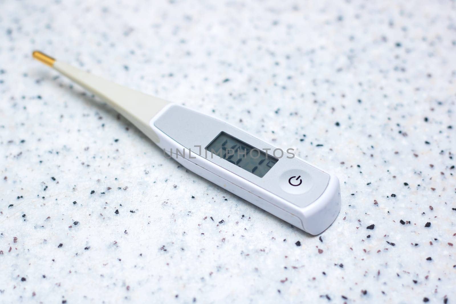 a digital thermometer shows a temperature of 40.1 degrees celsius High quality