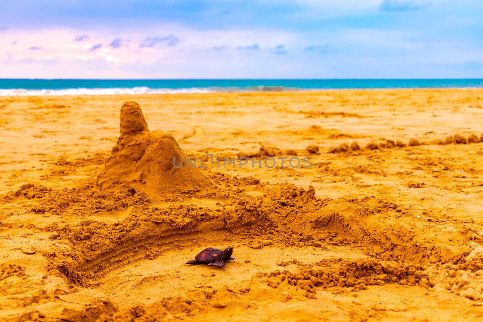 Temple of sand on the beach like a sandcastle in Bentota Beach in Sri Lanka.