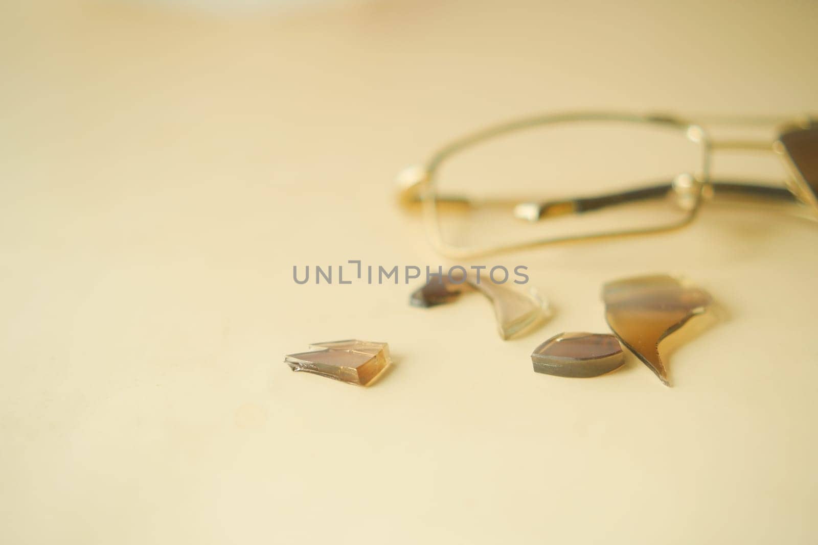 broken eye glass on table with copy space by towfiq007