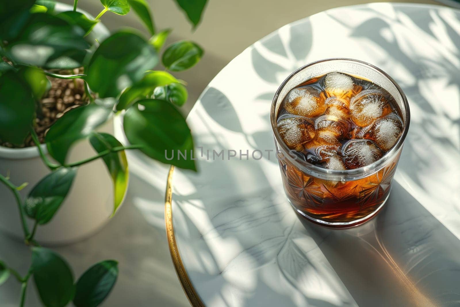 A glass of iced black coffee on white background with plant and clean composition, Minimal style.