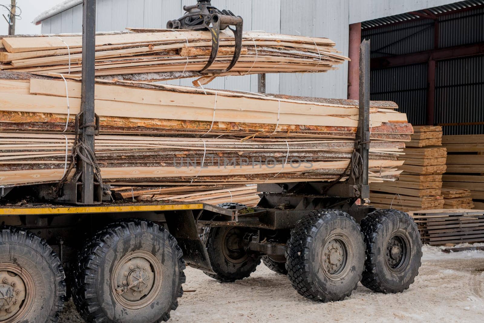 Woodworking. Image of truck transports boards in stock
