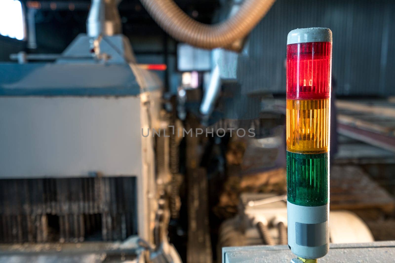 Image of tri-color LED on machine at sawmill by rivertime