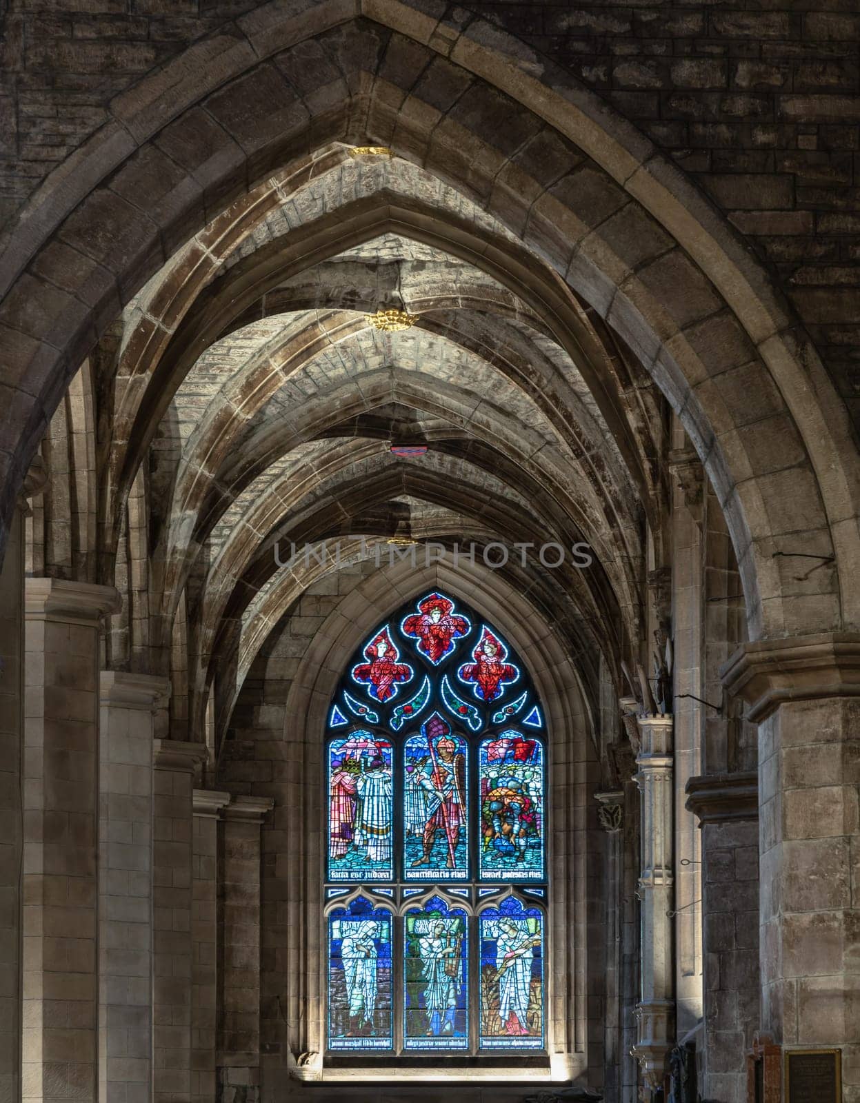 Edinburgh, Scotland - Jan 18, 2024 - Beautiful Glass stained window inside of The thistle chapel in St Giles' Cathedral or the High Kirk. The most important place of worship in the Edinburgh, Space for text, Selective focus.