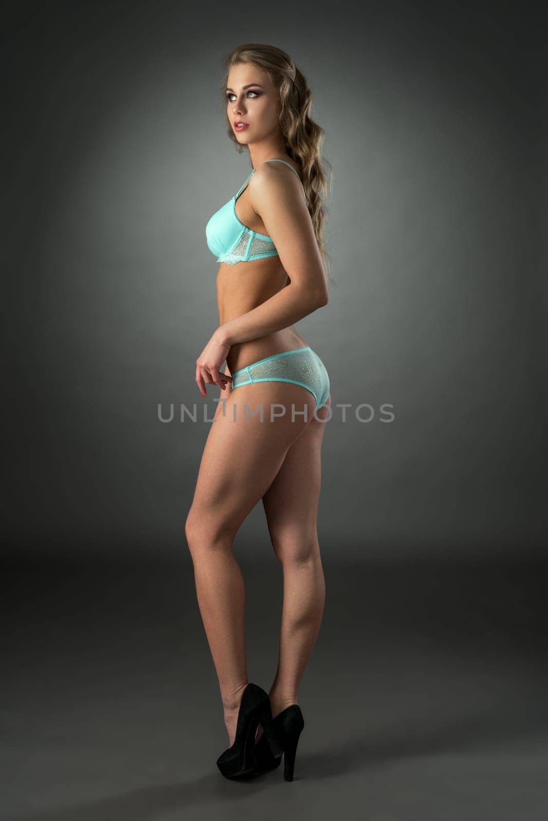 Erotica. Shot of model in lingerie pale blue color by rivertime