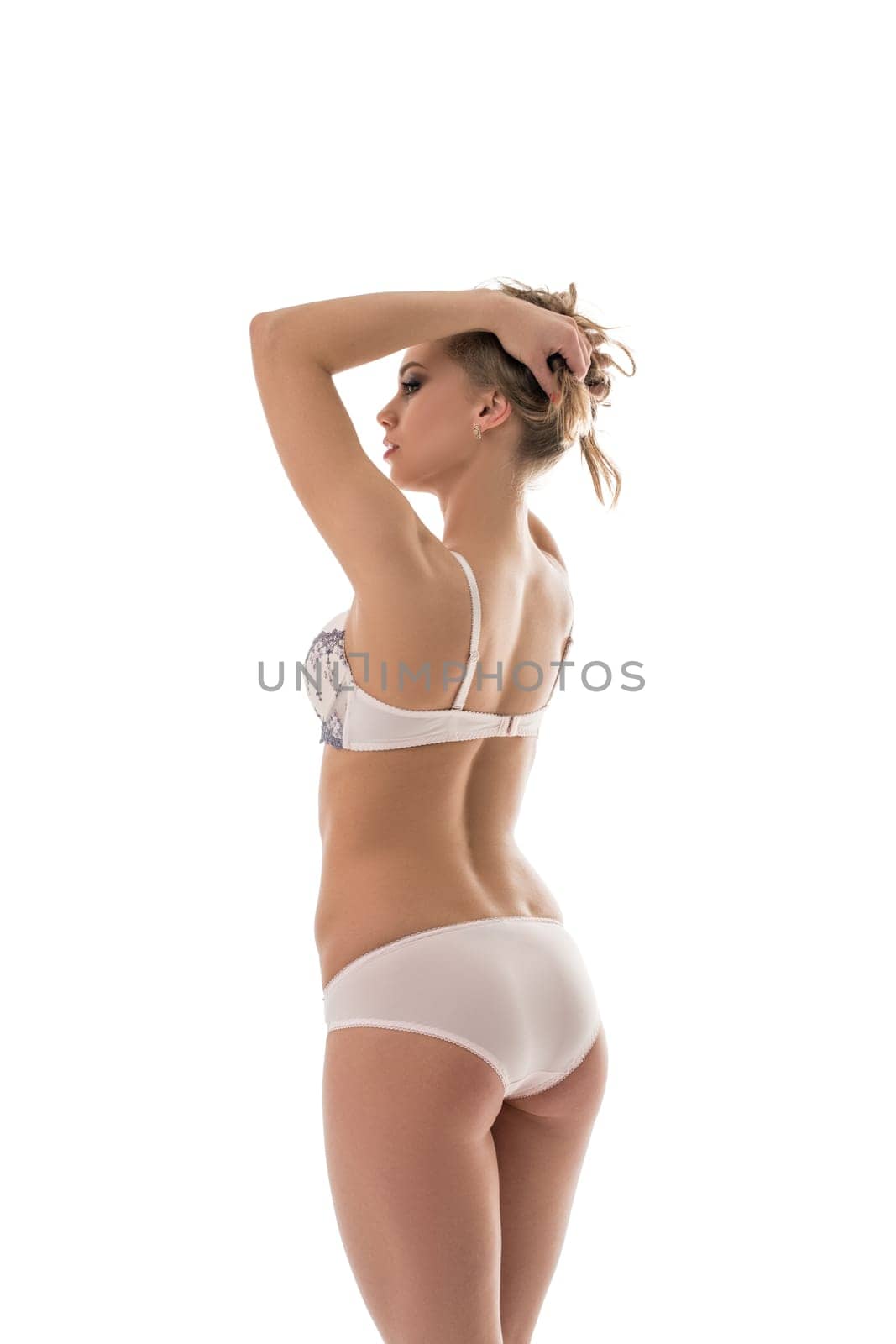 Catalog of underwear. Sexy woman shows pale pink model