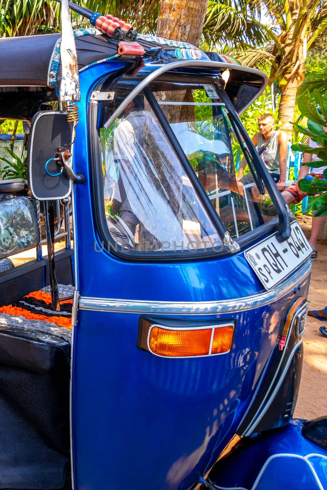 Blue Rickshaw Tuk Tuk cab vehicle Bentota Beach Sri Lanka. by Arkadij