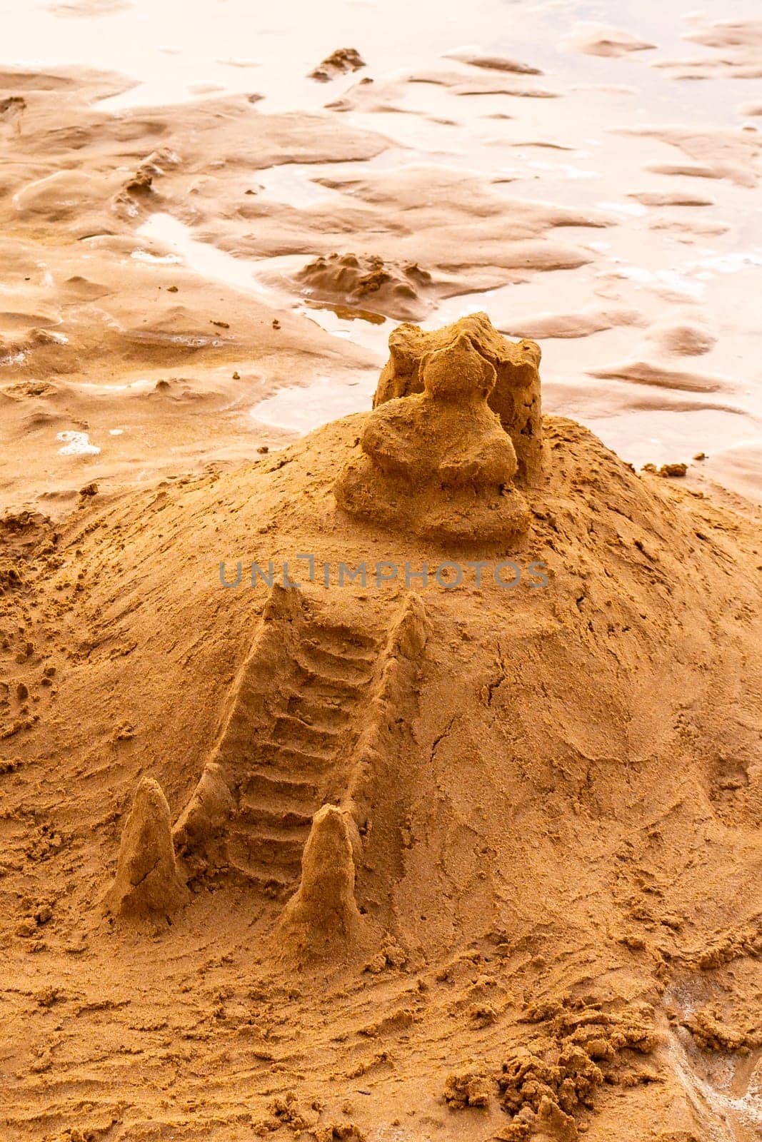 Temple of sand like a sandcastle Bentota Beach Sri Lanka. by Arkadij