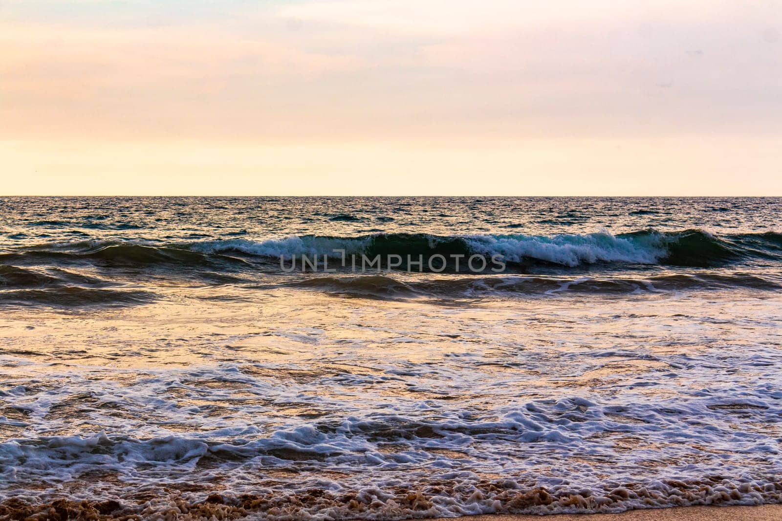 Beautiful sunny landscape panorama with huge powerful waves and clear water in Bentota Beach Galle District Southern Province Sri Lanka island.