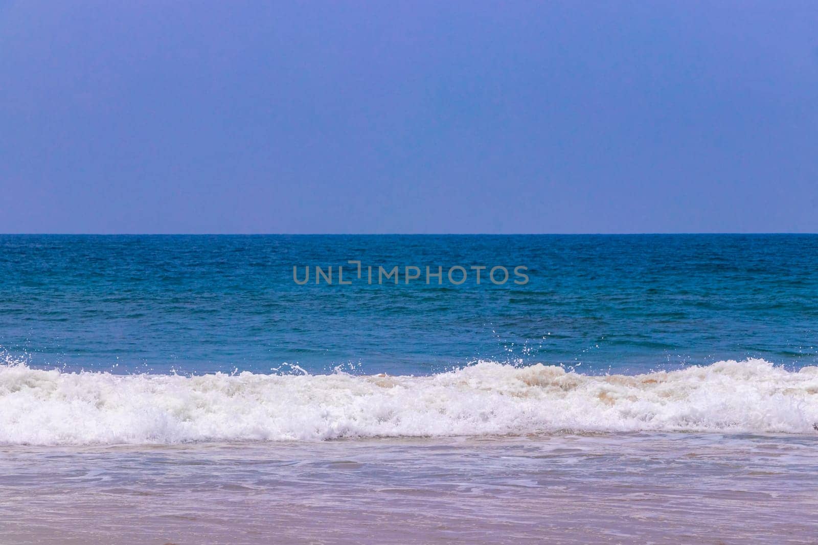 Beautiful landscape panorama strong waves Bentota Beach on Sri Lanka. by Arkadij