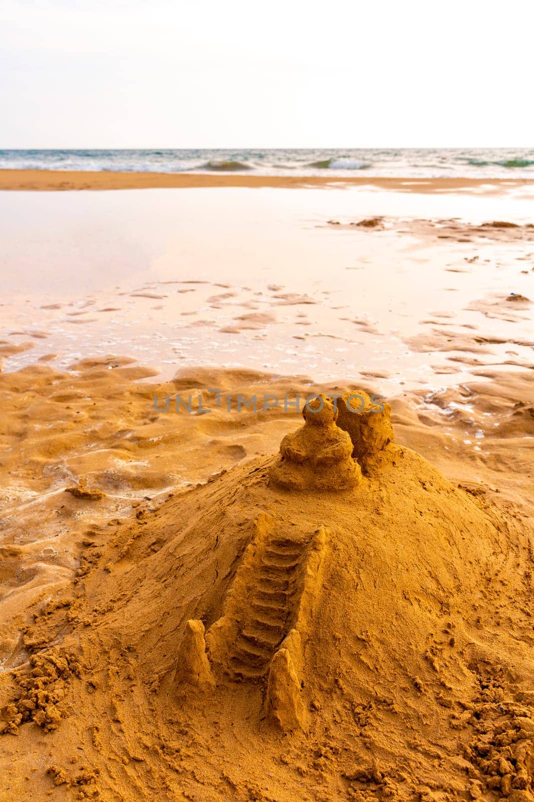 Temple of sand like a sandcastle Bentota Beach Sri Lanka. by Arkadij