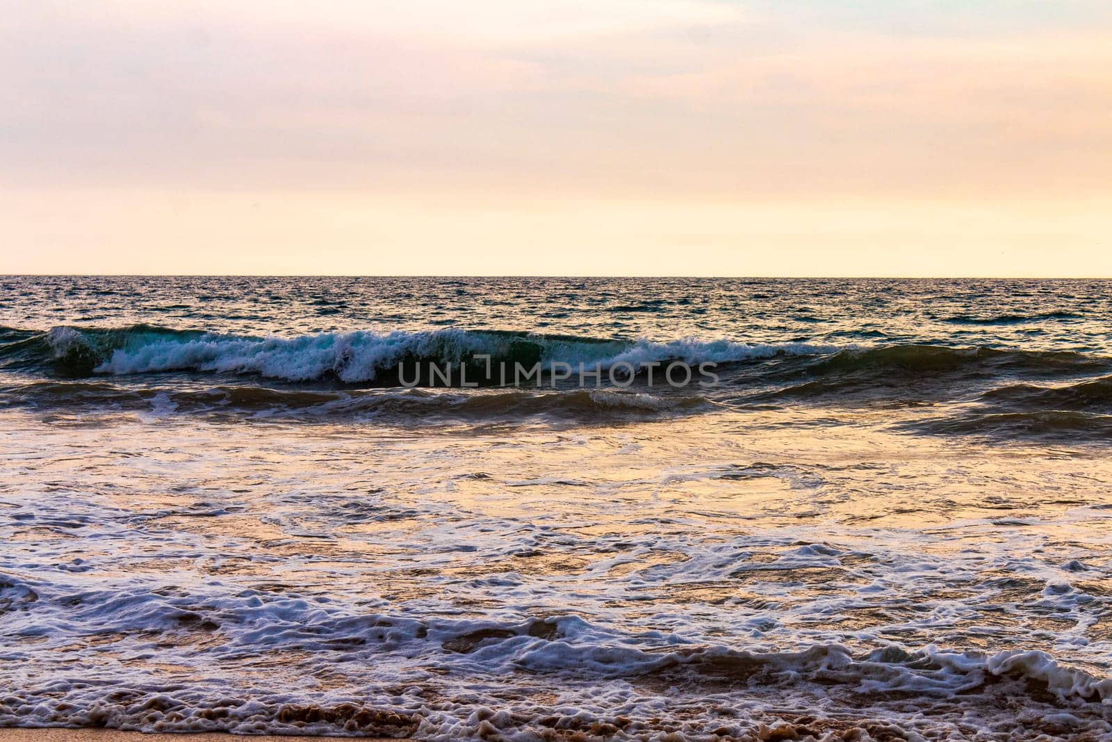 Beautiful sunny landscape panorama with huge powerful waves and clear water in Bentota Beach Galle District Southern Province Sri Lanka island.