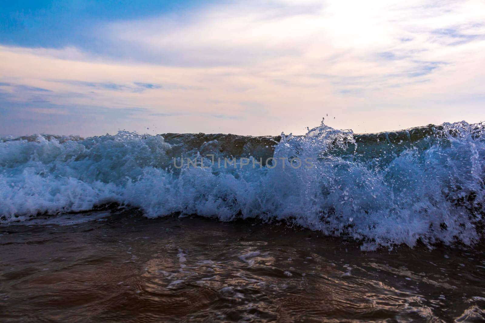 Beautiful sunny landscape panorama with huge powerful waves and clear water in Bentota Beach Galle District Southern Province Sri Lanka island.