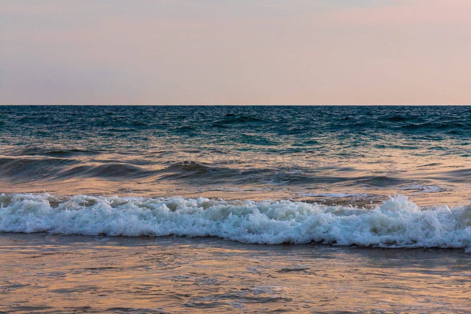 Beautiful sunny landscape panorama with huge powerful waves and clear water in Bentota Beach Galle District Southern Province Sri Lanka island.