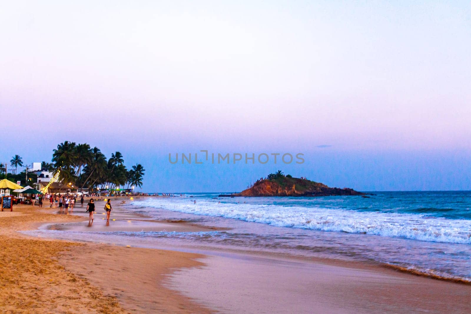 Beautiful colorful sunset on the beach Mirissa Beach Sri Lanka. by Arkadij