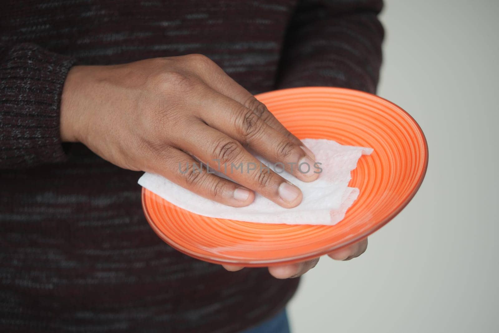 wiping plate with a tissue ,