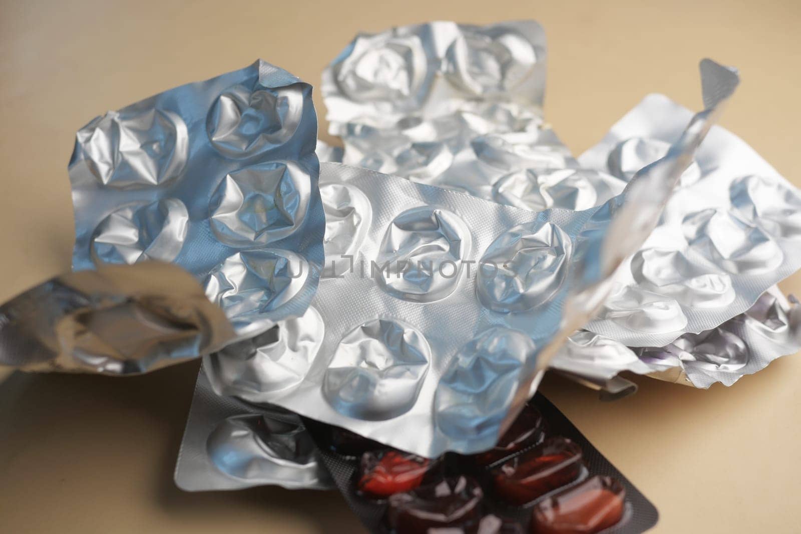 Close up of empty pills of blister pack on table by towfiq007