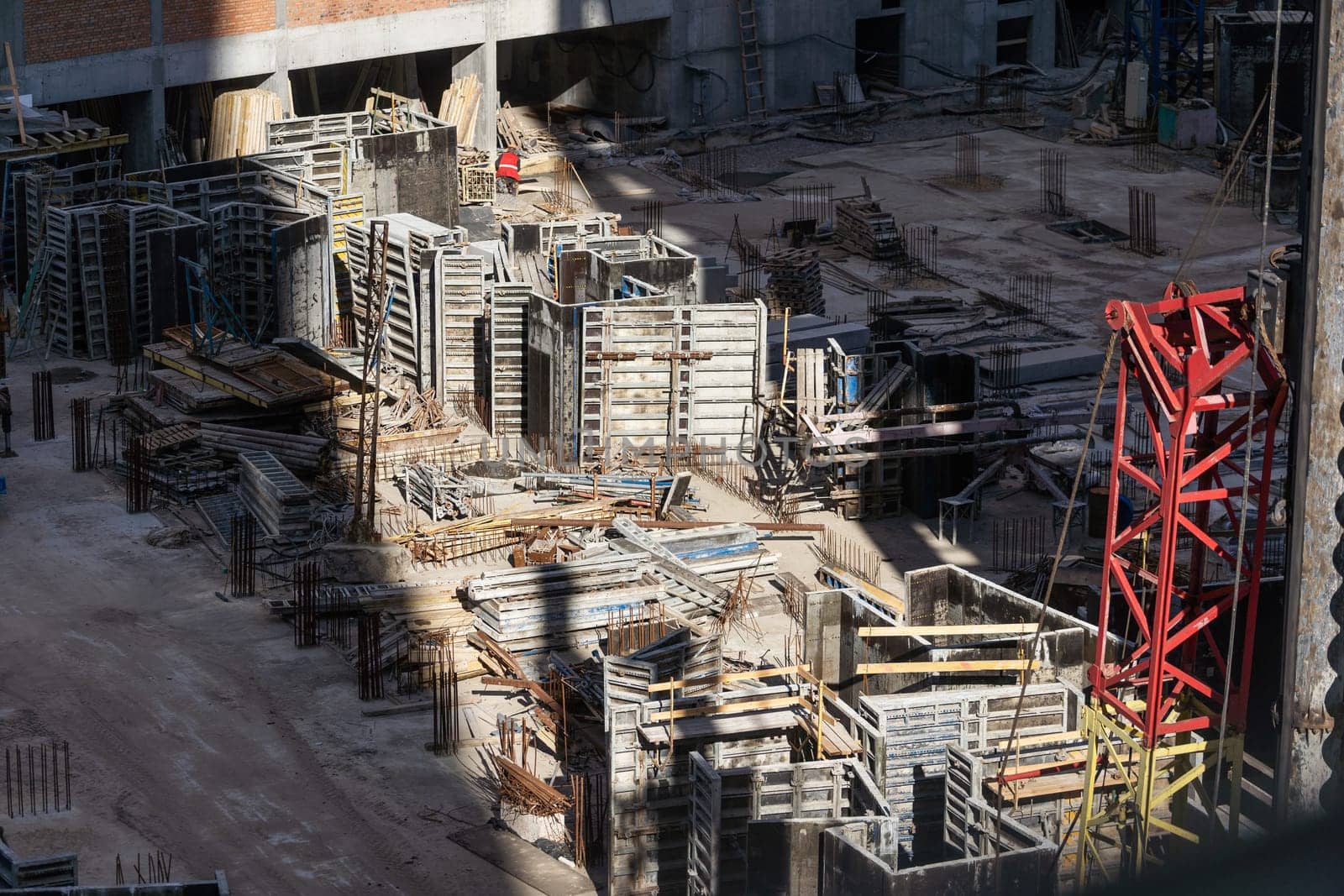 Aerial view of construction site, construction of new building in residential area. High quality photo
