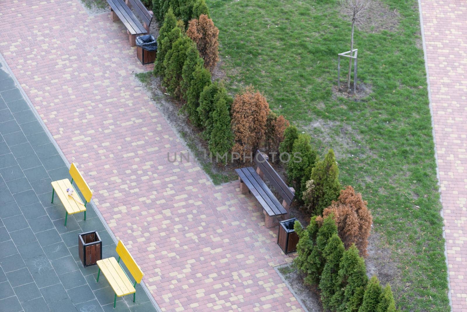 Stylized bench in a city park on a sunny day by Andelov13