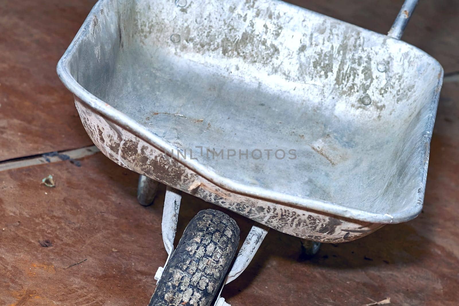 Construction metal wheelbarrow, various waste after repair by jovani68