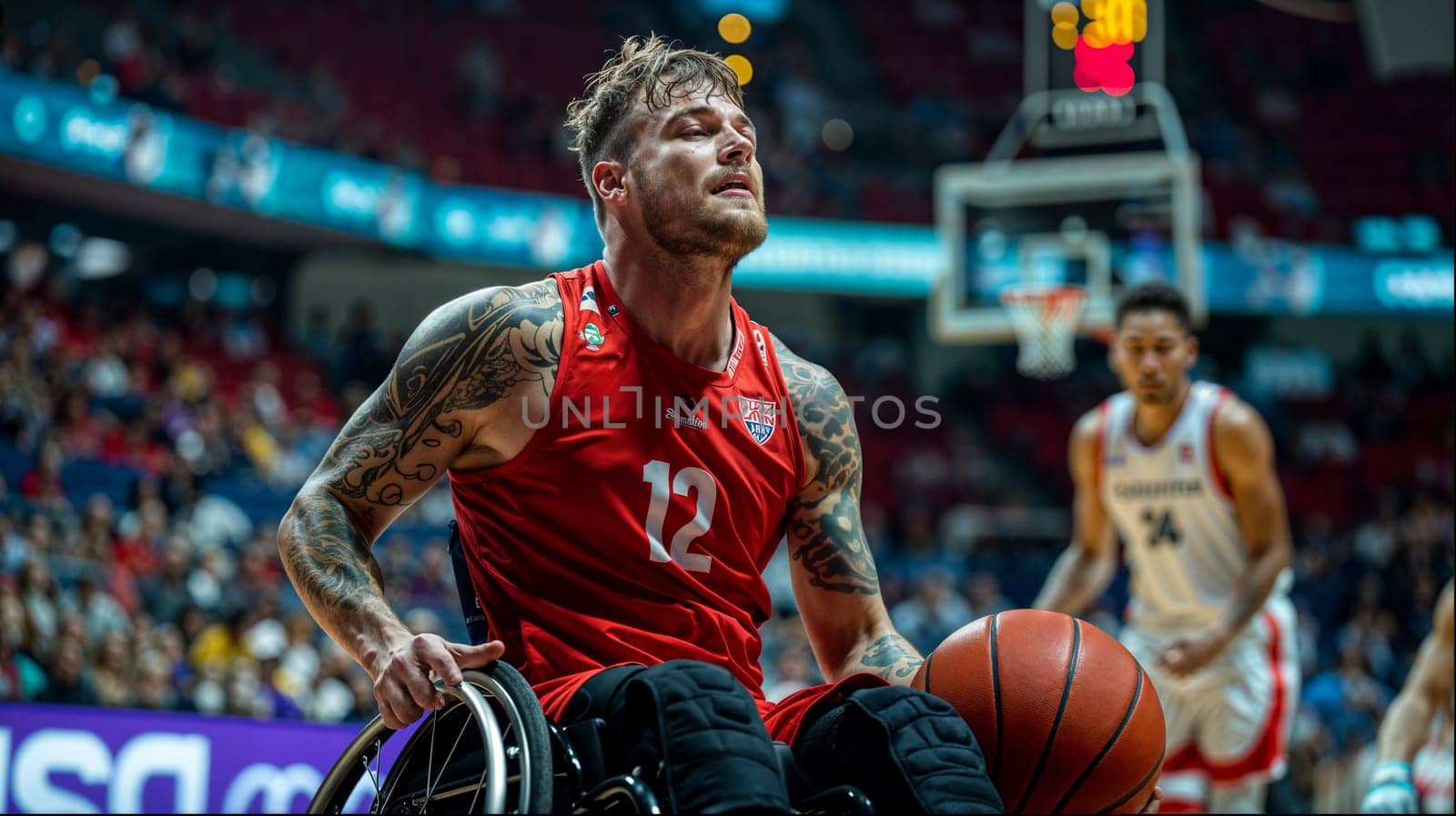 A man in a wheelchair passionately plays basketball on the court, showcasing athleticism and determination