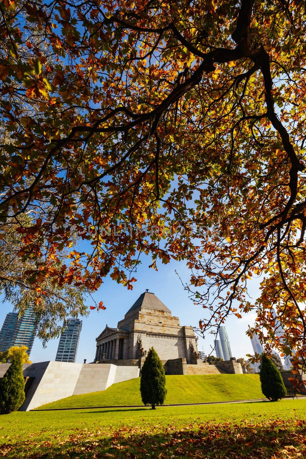 The Shrine of Remembrance and surrounding parklands and gardens during autumn at the Royal Botanic Gardens Victoria in melbourne, Victoria, Australia