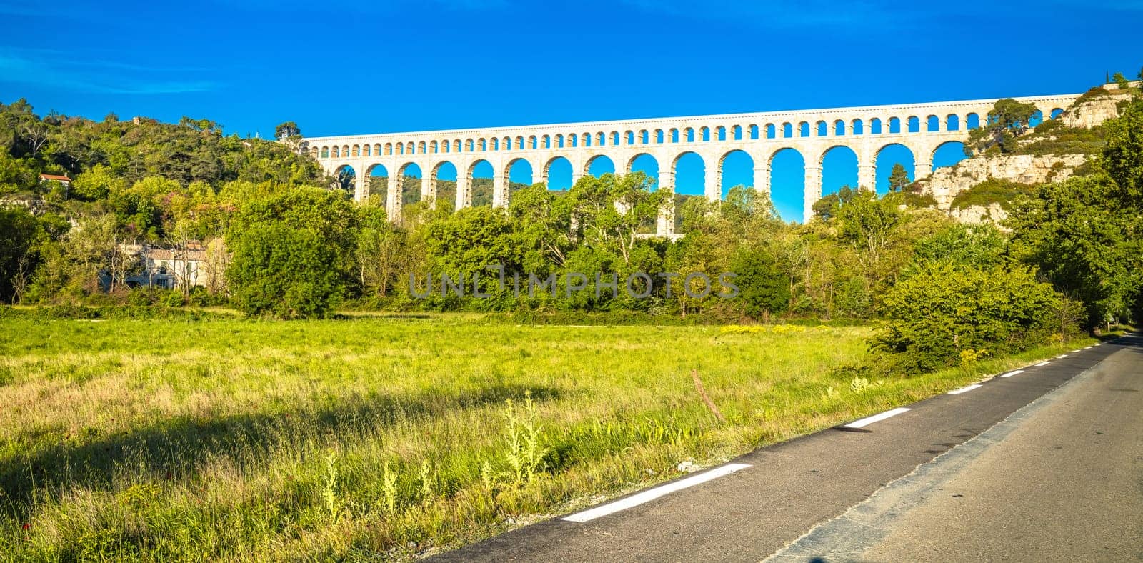 Roquefavour stone Aqueduct in green landscape panoramic view, landmark of southern France