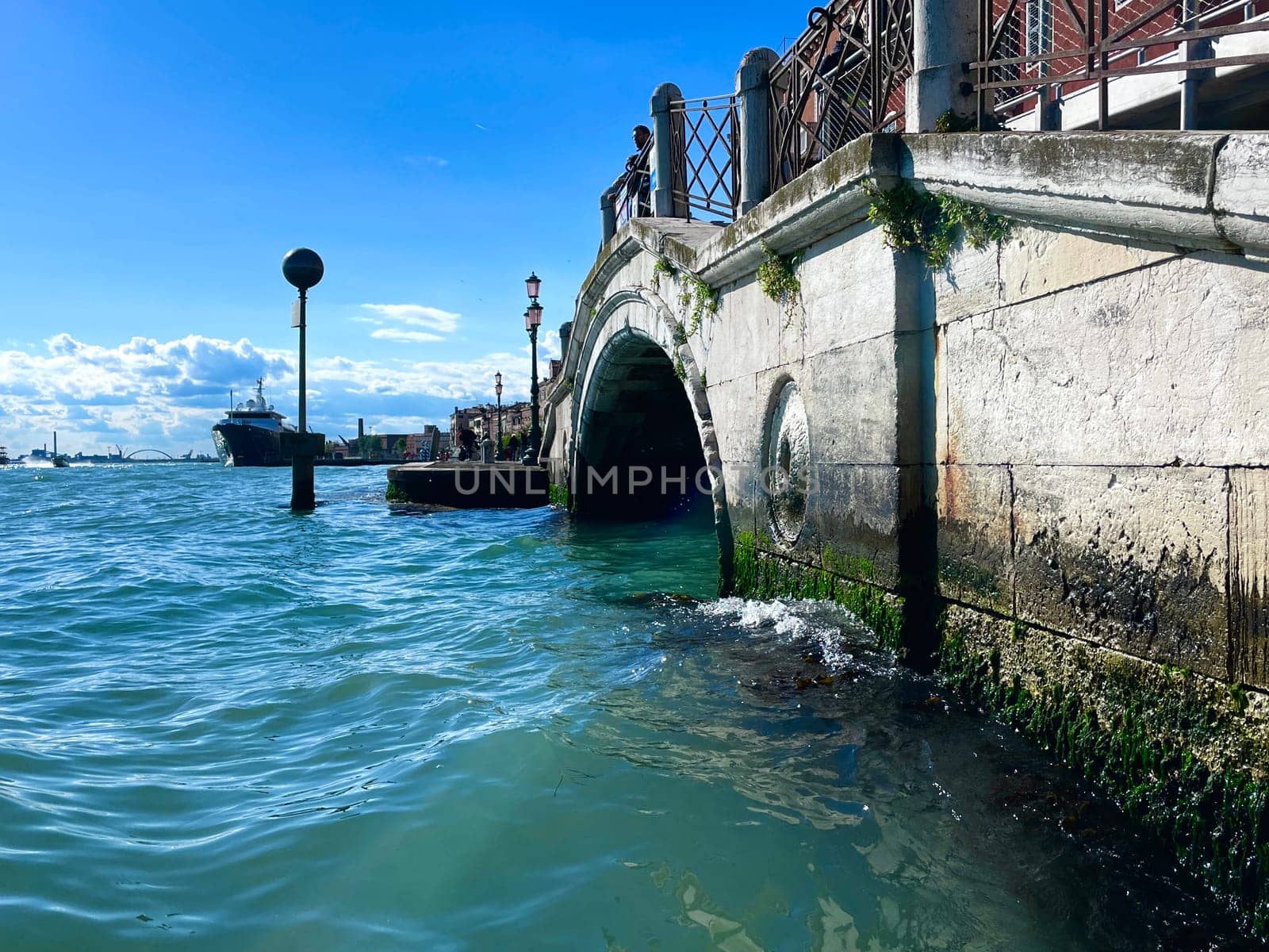 Italy, April 25, 2024. The Grand Canal is the most famous canal in Venice on Rialto Island by MilaLazo