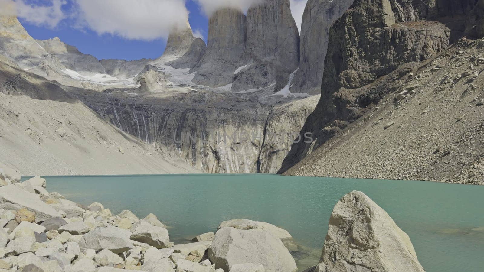 Stunning timelapse shows vibrant turquoise lake at Torres del Paine's base.