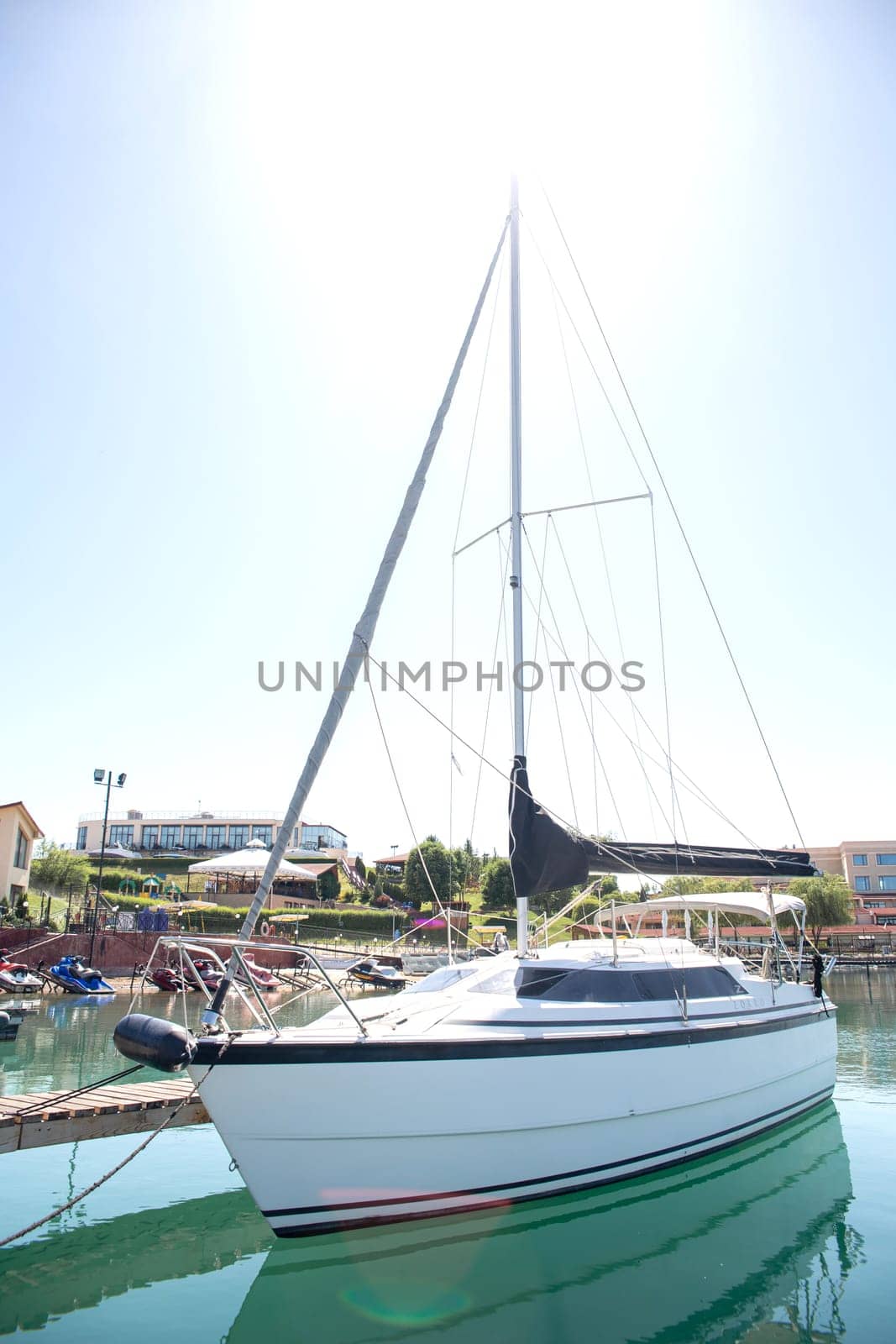 pleasure boat on the water on a sunny summer day by Pukhovskiy