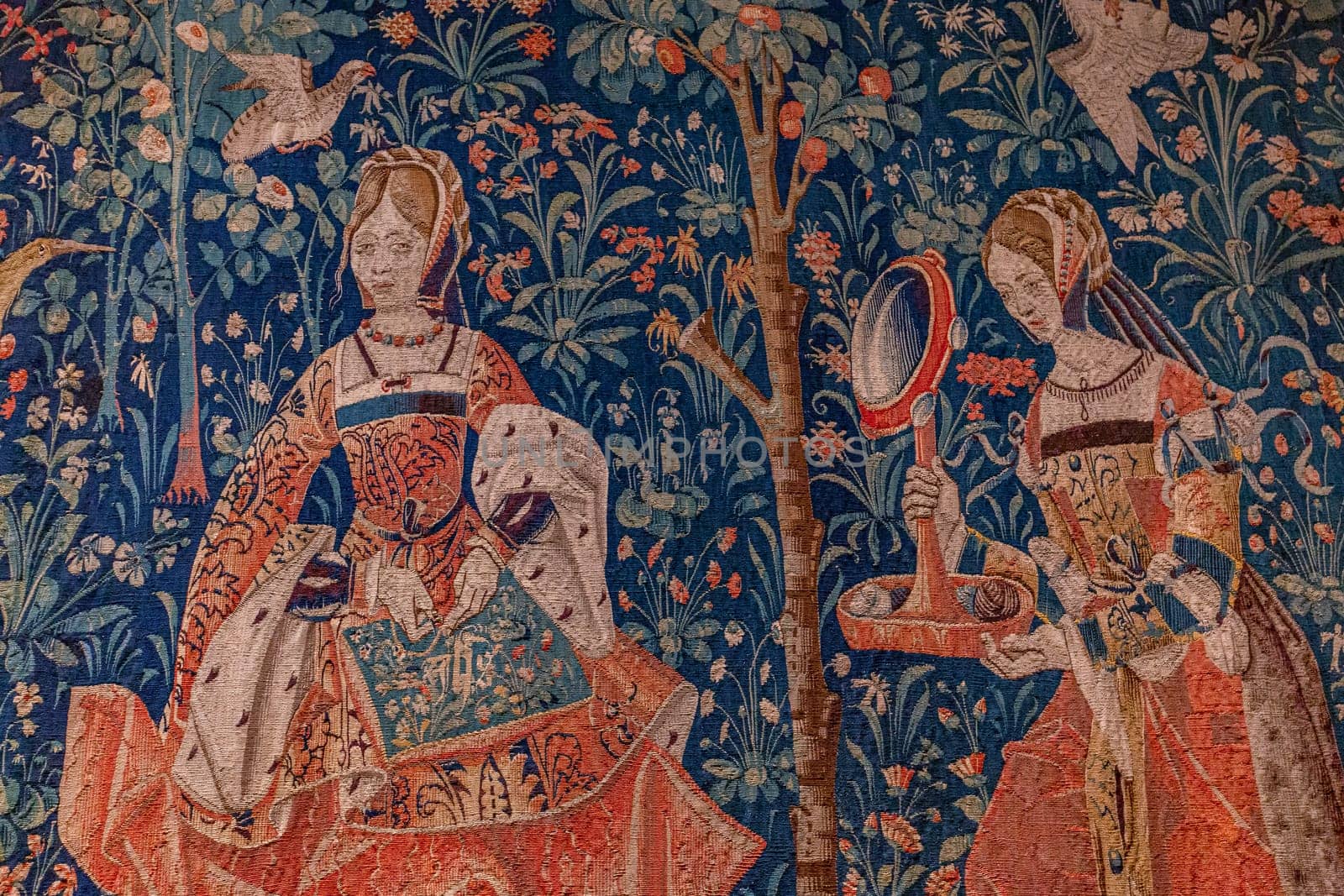 PARIS, FRANCE, DECEMBER 16, 2023 : The lady and the unicorn, renaissance tapestry, Cluny chapel, Paris, France