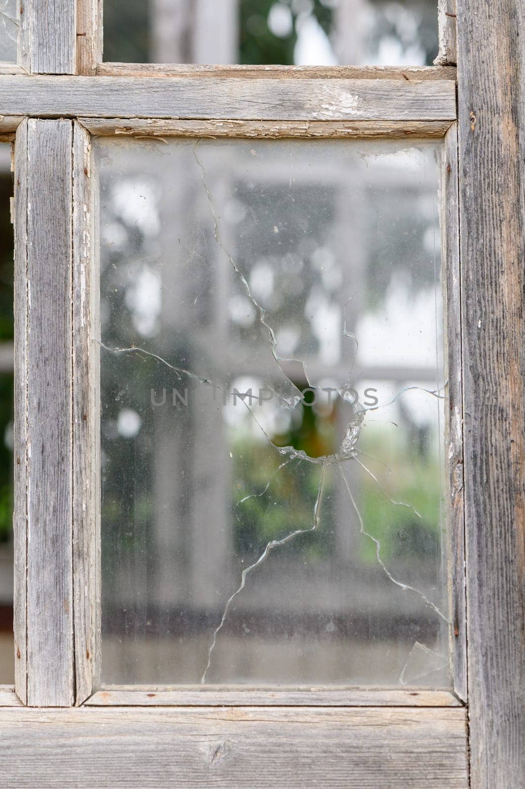 Broken glass window outside by Mixa74