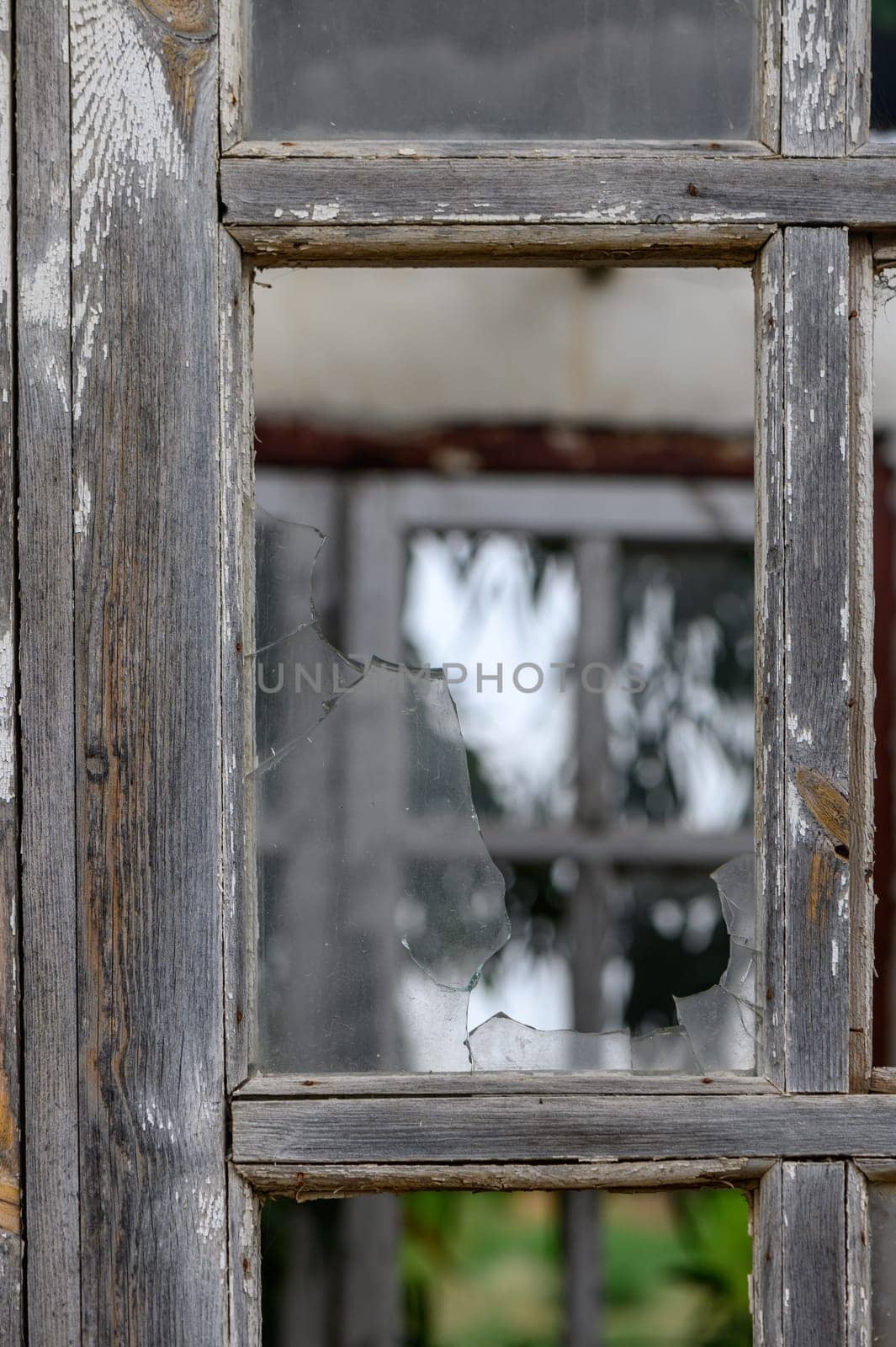 Broken street window and shards of glass by Mixa74