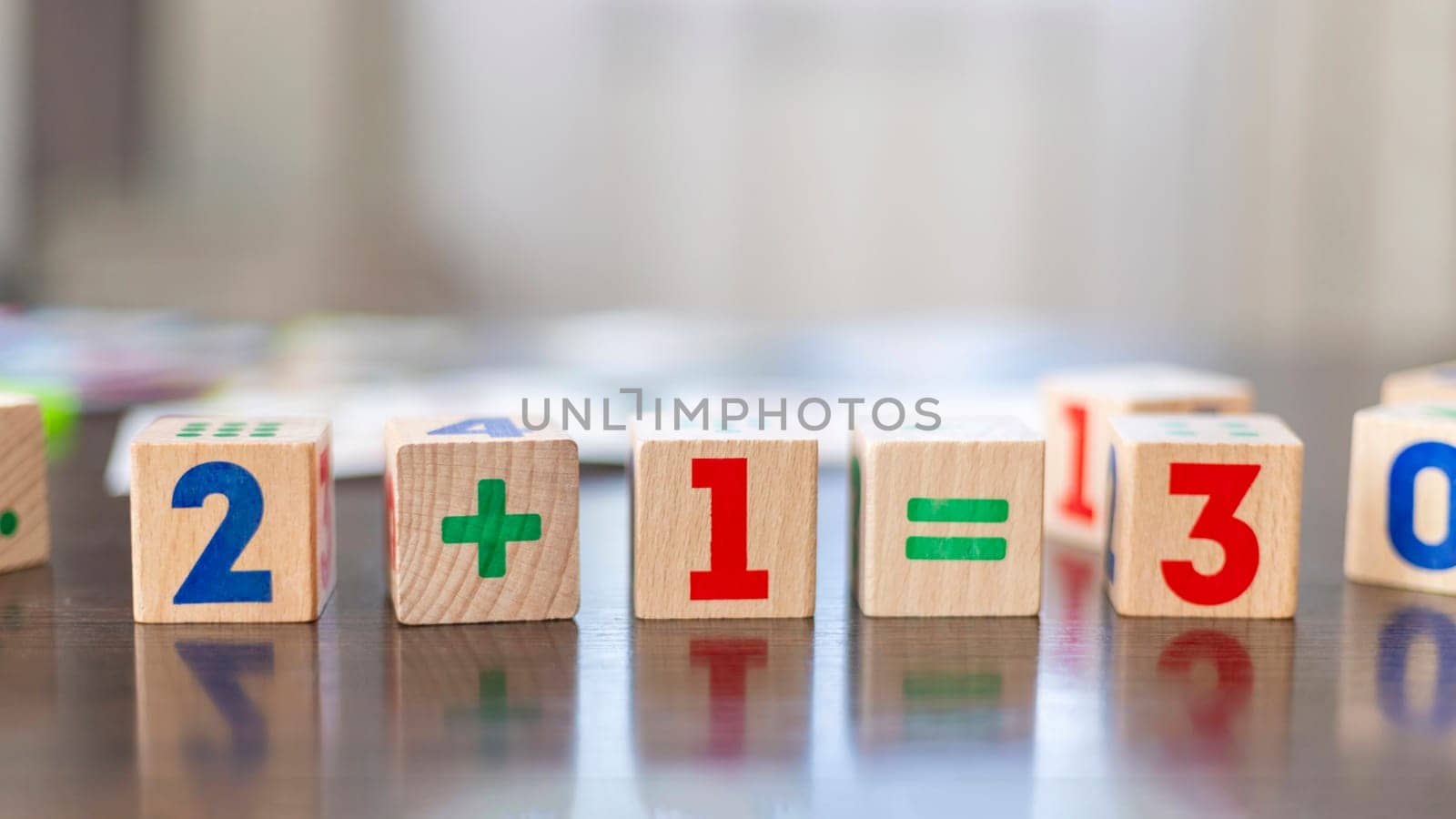 Wooden Math Blocks on Table Education Concept by andreyz