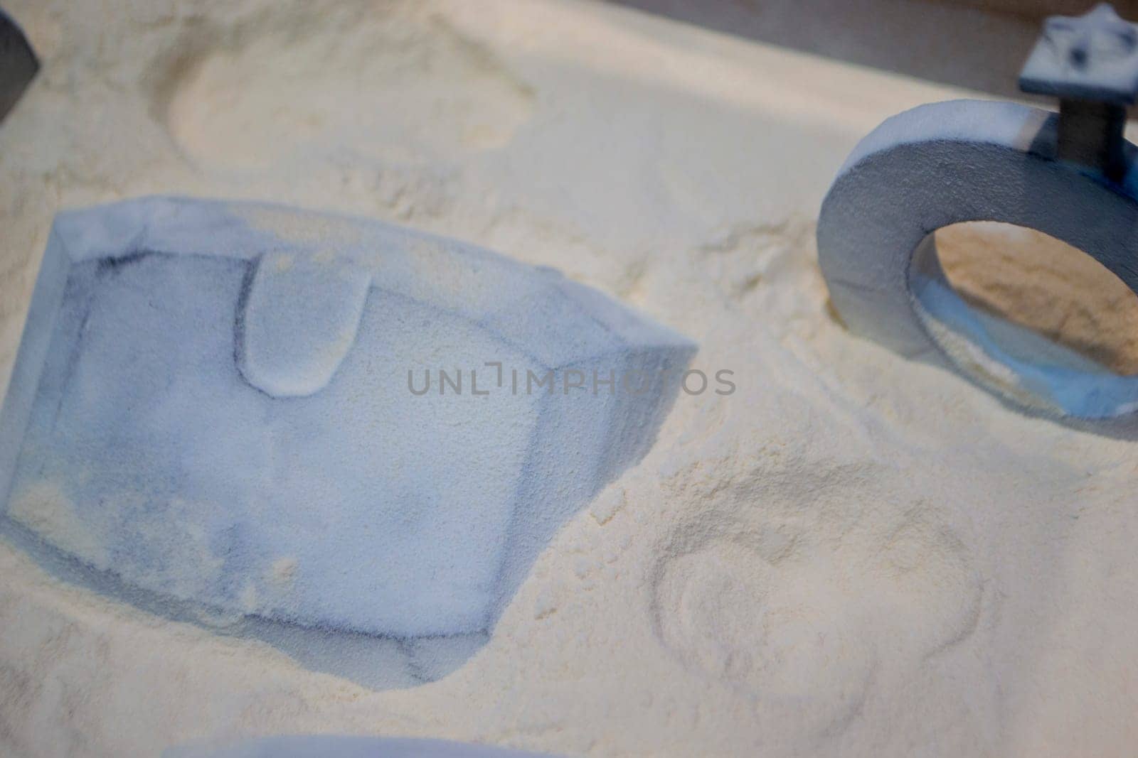 White polyamide powder and object on 3D printed from white polyamide powder close-up. Polyamide powder for creating objects on 3D printer. Additive MJF Multi Jet Fusion technologies. Thermoplastic