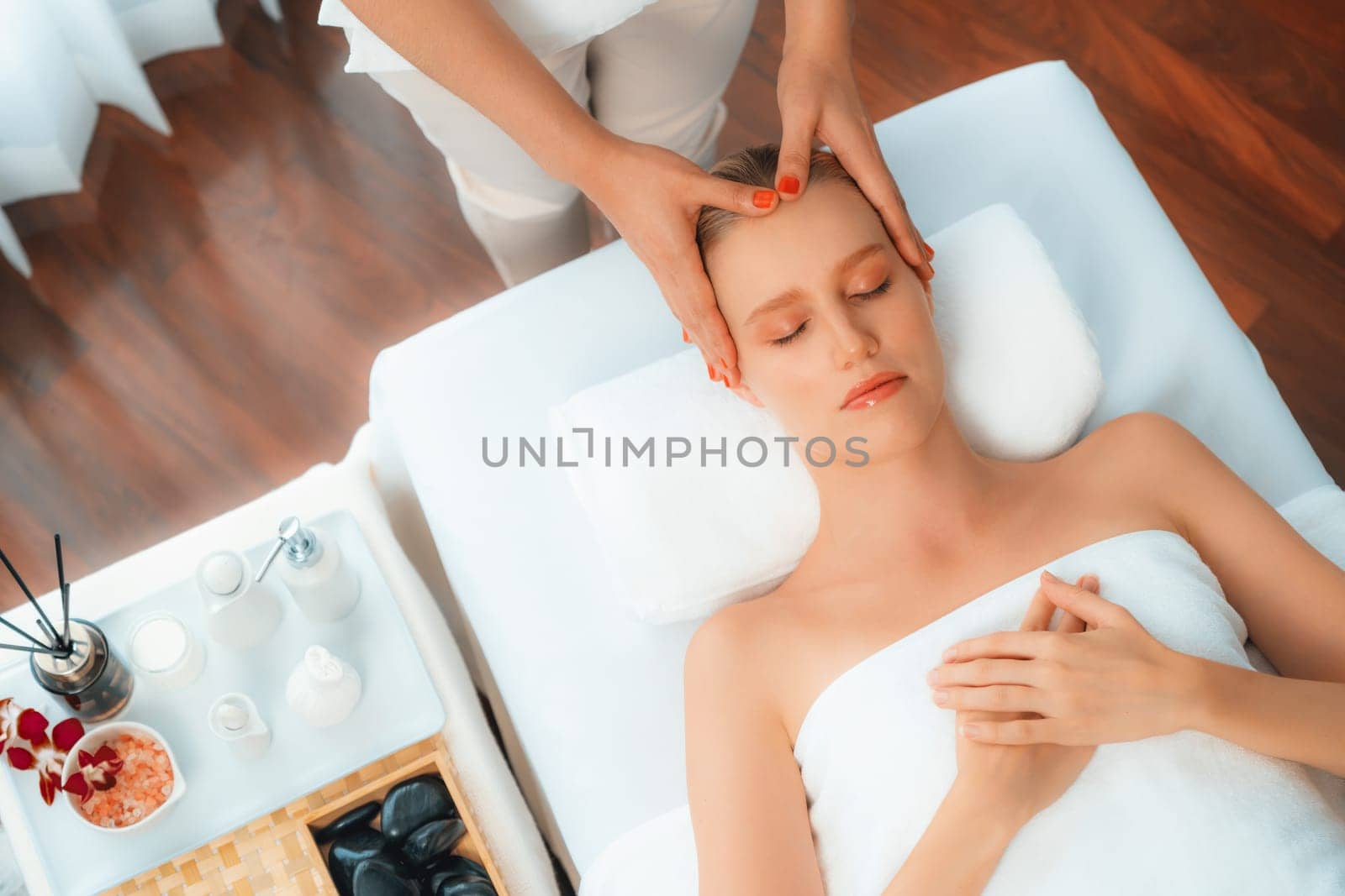 Panorama top view woman enjoying relaxing anti-stress head massage. Quiescent by biancoblue