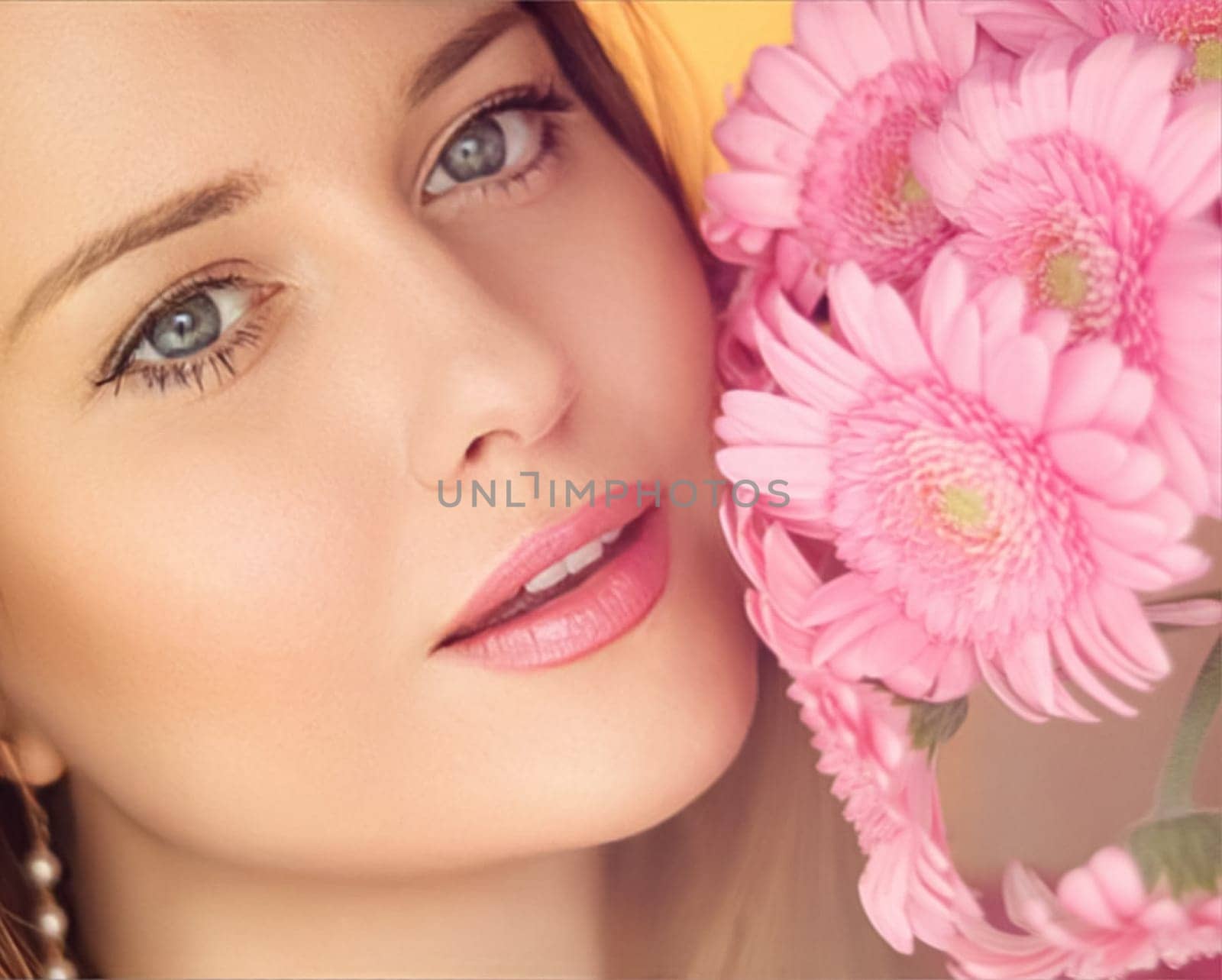 Beauty, holiday and bridal makeup, beautiful woman with pink flowers bouquet as cosmetics, perfume and face skincare by Anneleven
