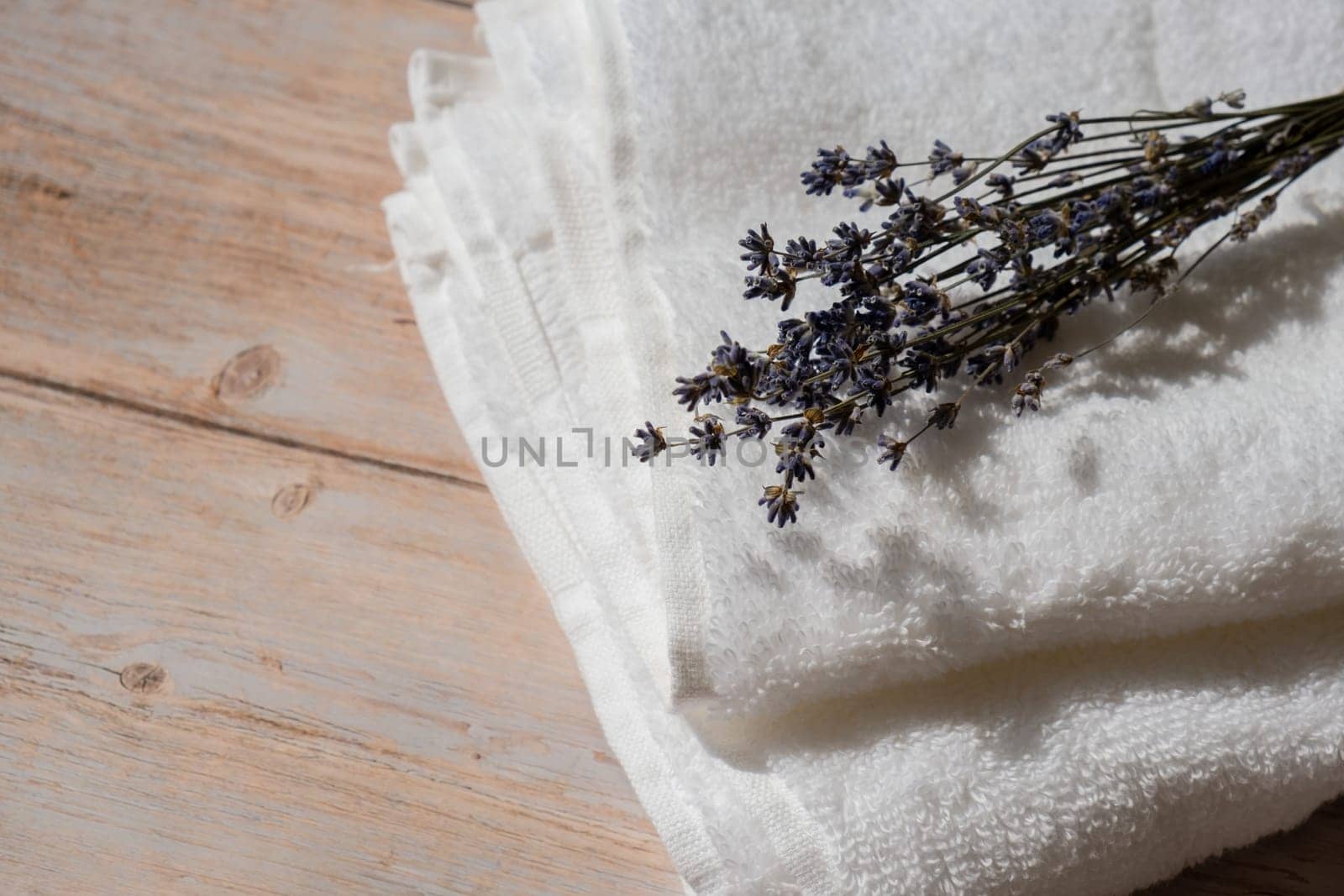 Dried lavender flowers on cotton towel. Esthetic aesthetic composition with copy space for wallpaper, black, template. Minimal eco style still life by anna_stasiia
