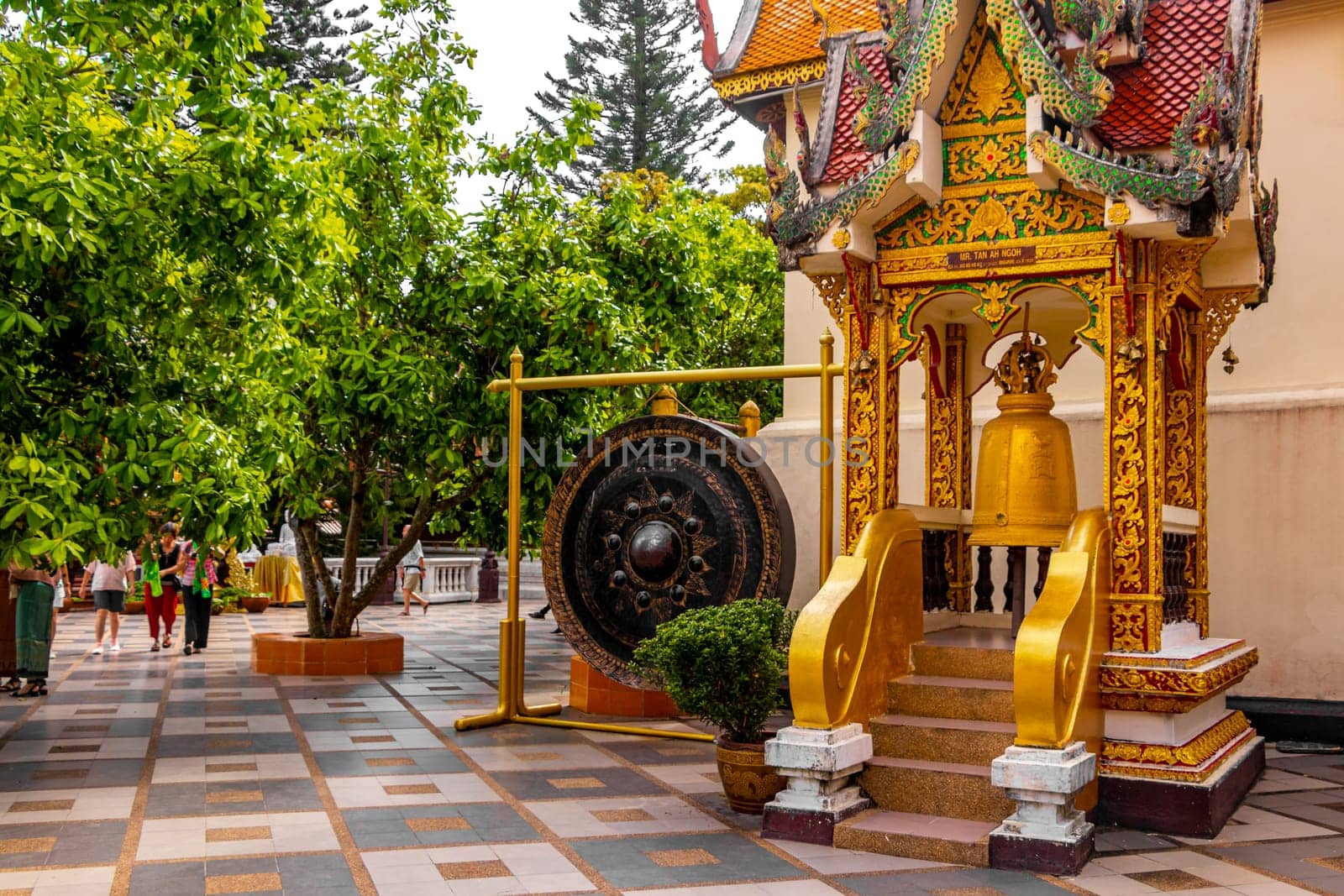 Golden Wat Phra That Doi Suthep temple bells Chiang Mai Thailand. by Arkadij