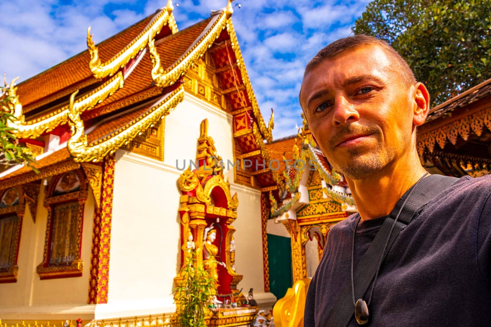 Golden Wat Phra That Doi Suthep temple tourist Chiang Mai Thailand. by Arkadij