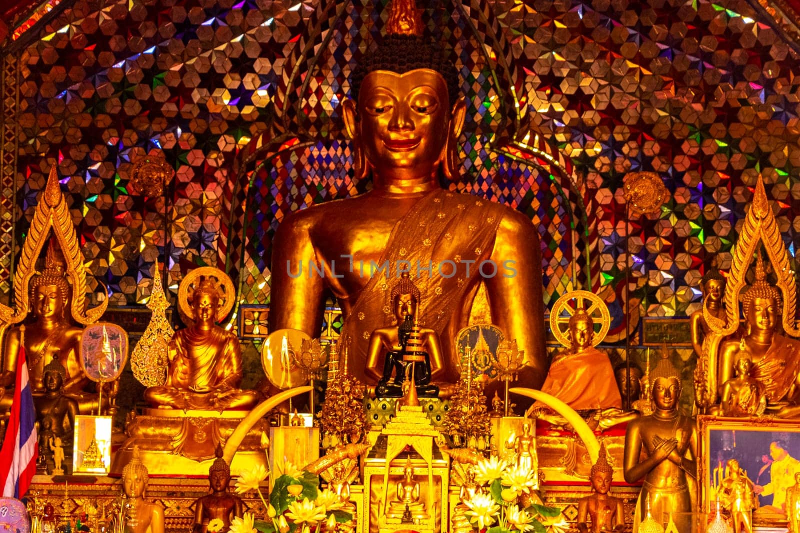 Buddha sculture figure statue at golden gold Wat Phra That Doi Suthep temple temples building in Chiang Mai Amphoe Mueang Chiang Mai Thailand in Southeastasia Asia.