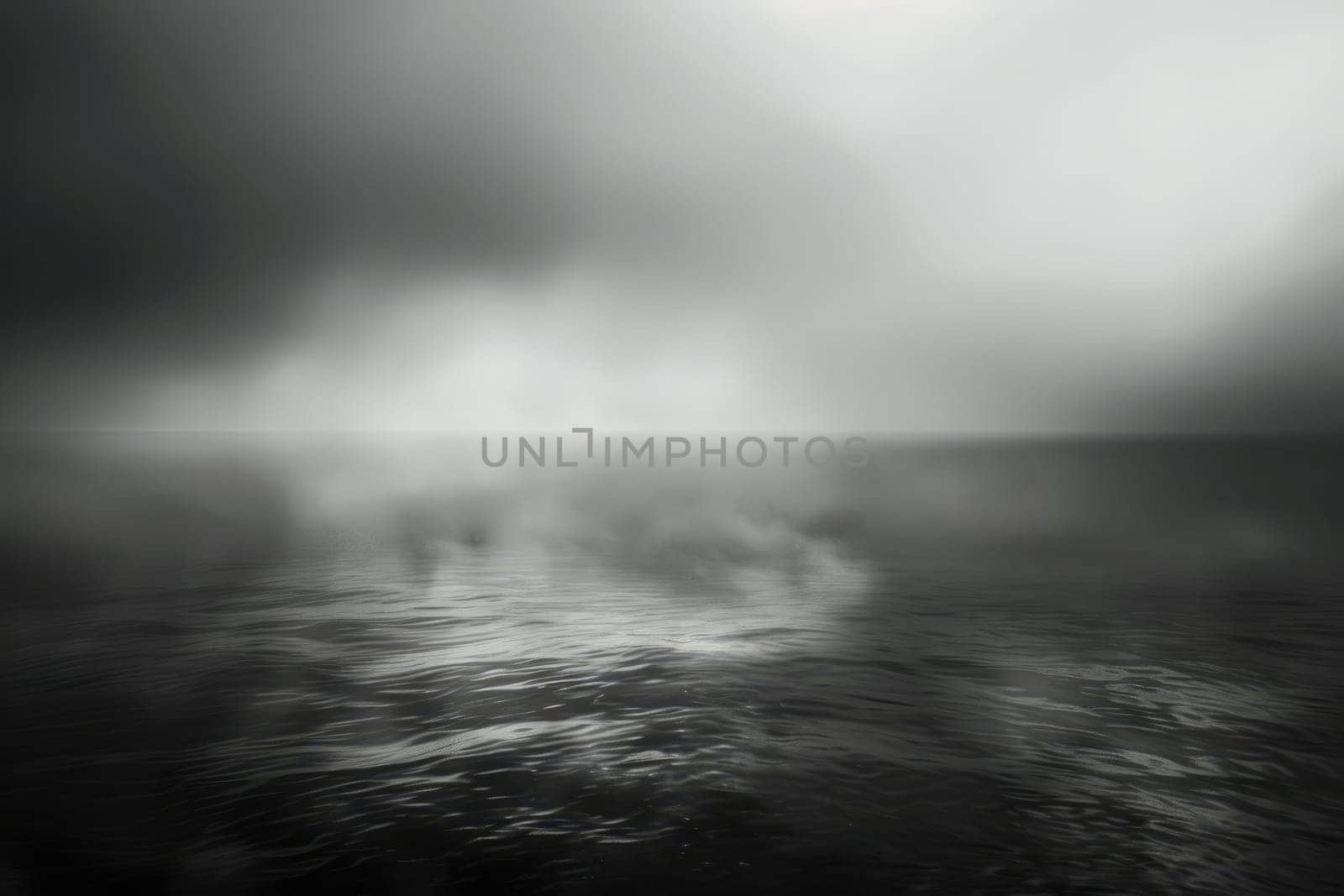A grayscale photo of a calm sea on a foggy day. AIG51A.