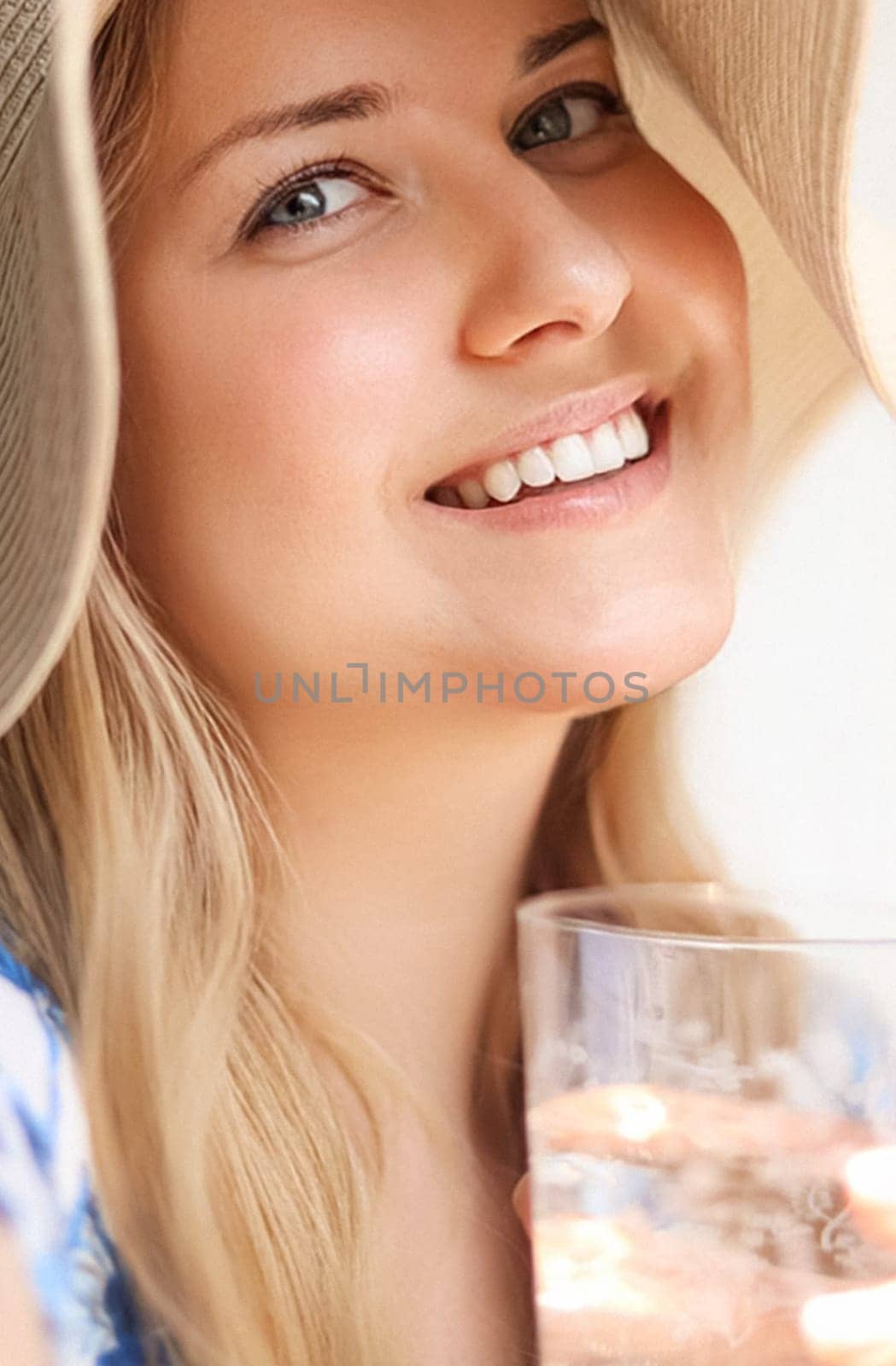 Fashion, travel and beauty face portrait of young woman, beautiful model wearing beach sun hat in summer, head accessory and style by Anneleven
