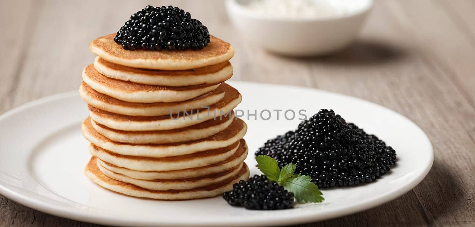 Pancakes with caviar for breakfast highlight luxury morning meal. Golden stack topped with black caviar by panophotograph