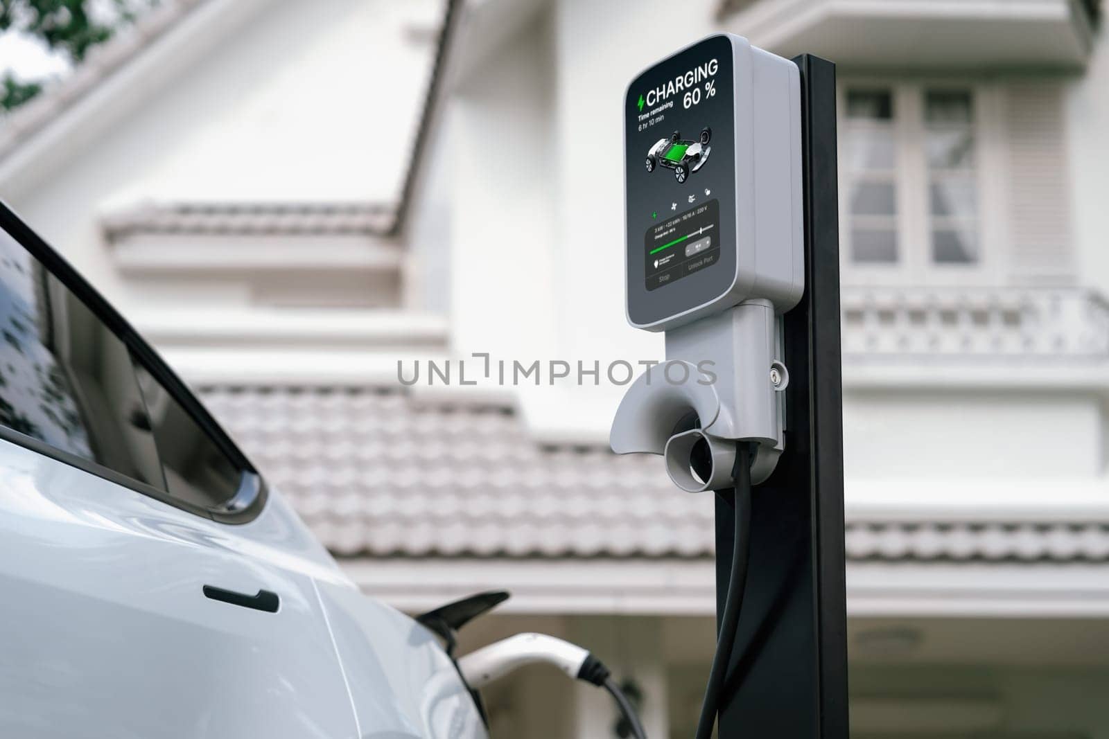 Electric vehicle technology utilized to residential area or home charging station for EV car battery recharge. Eco-friendly transport by clean and sustainable energy for future environment. Synchronos