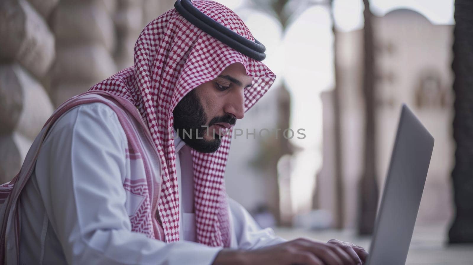 arabic man use laptop computer in office AIG51A.